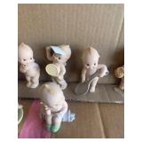 Kewpie figurines (8)