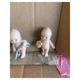Kewpie figurines (8)