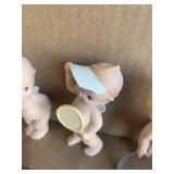 Kewpie figurines (8)