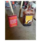 Whisky bottle and Tobacco can
