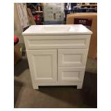 Home Decorators Collection Sedgewood 30.5 in. W x 18.75 in. D x 34.375 in. H Single Sink Bath Vanity in White with Arctic Solid Surface Top Slight Damage on Bottom  Customer Returns See Pictures