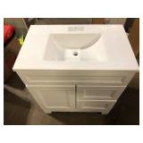 Home Decorators Collection Sedgewood 30.5 in. W x 18.75 in. D x 34.375 in. H Single Sink Bath Vanity in White with Arctic Solid Surface Top Slight Damage on Bottom  Customer Returns See Pictures