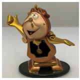 EST. $175.00-$225.00 Vintage WDCC Beauty & The Beast Cogsworth Figurine  With COA In Original Box EST. $175.00-$225.00 Vintage WDCC Beauty & The Beast Cogsworth Figurine  With COA In Original Box