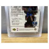 2001 U.D. Playmakers Tracy McGrady Warm-Up NBA Jersey Card Graded PSA 8 - Toronto Raptors *J
