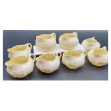 Set of 8 Belleek Limpet Creamers Ivory with Yellow Interior