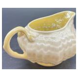 Set of 8 Belleek Limpet Creamers Ivory with Yellow Interior