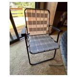 Round Glass Patio Table with Woven Edge and Folding Chair