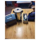 Lot of Kitchen and Travel Items Including Igloo Cooler, Coffee Urn, Soft Cooler, and Steam Iron