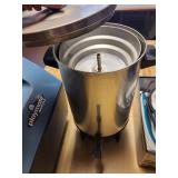 Lot of Kitchen and Travel Items Including Igloo Cooler, Coffee Urn, Soft Cooler, and Steam Iron