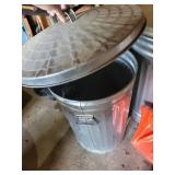 Garage Utility Lot with Trash Cans, Shovels, Brooms, and Containers