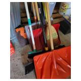Garage Utility Lot with Trash Cans, Shovels, Brooms, and Containers