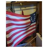 Collection of Vintage and Modern American Flags with Poles