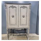 Antique Wood Cabinet with Ornate Detailing and Red Interior