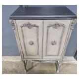 Antique Wood Cabinet with Ornate Detailing and Red Interior