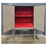 Antique Wood Cabinet with Ornate Detailing and Red Interior