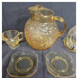 Amber Depression Glass Pitcher with Cups and Saucers Set