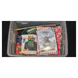 Large Assortment of Christmas Gift Bags, Cards, and Tissue Paper in Storage Bin