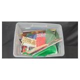 Large Assortment of Christmas Gift Bags, Cards, and Tissue Paper in Storage Bin