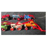 Set of Miniature Tractor Ornaments with Red Ribbons