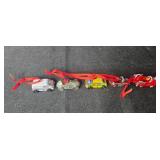 Set of Holiday and Toy-themed Miniature Ornaments with Red Ribbons