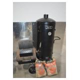 Dyna-Glo Signature Series Vertical Smoker with Mesquite Wood Chunks