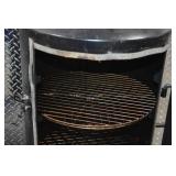 Dyna-Glo Signature Series Vertical Smoker with Mesquite Wood Chunks