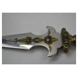 Decorative Dagger with Ornate Handle and Engraved Blade