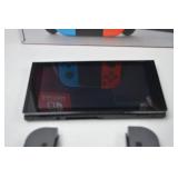 Nintendo Switch Console with Gray Joy-Con Controllers, Case, and Accessories
