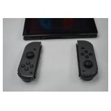 Nintendo Switch Console with Gray Joy-Con Controllers, Case, and Accessories