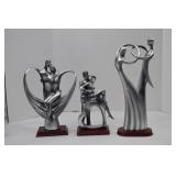 Set of three modern romantic silver-tone resin sculptures