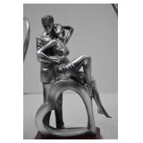 Set of three modern romantic silver-tone resin sculptures