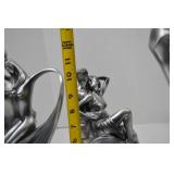 Set of three modern romantic silver-tone resin sculptures
