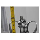 Set of three modern romantic silver-tone resin sculptures