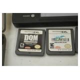 Nintendo DSi Console w/ Charger, 5 Games, and Game Case
