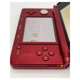 Nintendo 3DS Metallic Red Handheld Video Game Console with Stylus & Pilotwings Resort Game in Good Working Condition
