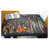 Screwdrivers, Pliers and Gloves.