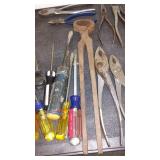 Screwdrivers, Pliers and Gloves.