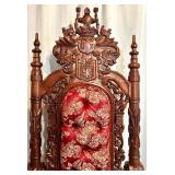 Ornate Antique Carved Throne Chair with Red Floral Upholstery and Lion Head Arms
