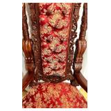 Ornate Antique Carved Throne Chair with Red Floral Upholstery and Lion Head Arms