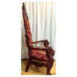 Ornate Antique Carved Throne Chair with Red Floral Upholstery and Lion Head Arms