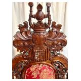 Ornate Antique Carved Throne Chair with Red Floral Upholstery and Lion Head Arms