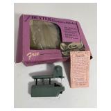 1950’s Hair Net & Dexter Handheld Automatic Hemmer & Stitcher Sewing Machine