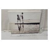 Black and White Canvas Print with Children Playing on Dock