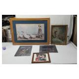 Framed Art and Photographs The largest piece depicts a young girl leading geese, a religious scene, cityscapes and a Coca-Cola themed print