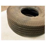 (1) 10" Tire, (2) Butyl Inner Tubes Size 4.10/3.50, (1) Larin Heavy Duty Inner Tube Size 4.10/3.50-4 (in original packaging)