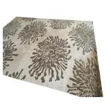 K - Area Rug with Abstract Floral Pattern