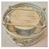 LR - Decorative Candle Holder, Vanilla Breve Scented Candle, and Glass Oil Lamp with Floral Foliage Display