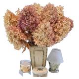 LR - Decorative Candle Holder, Vanilla Breve Scented Candle, and Glass Oil Lamp with Floral Foliage Display