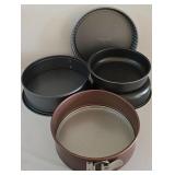 LR - Kitchenware Collection with Popover Pans, Bundt Pan, Springform Pans, Colander, and Salad Spinner