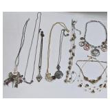 K - Assorted Necklace Lot with Mixed Metals, Charms, and Decorative Accents
